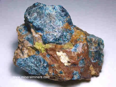 Apatite in Jasper Mineral Specimens: blue apatite in jasper matrix specimens